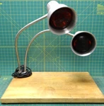 Carlisle HL8285B Flexiglow Aluminum Dual Arm Heat Lamp With Cutting Board. Fixed Price $649.98.