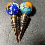 2 Semi-precious Inlaid Stone Globe Wine Bottle Stoppers Alexander Kalifano. Fixed Price $42.00.