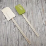Creuset Large Scraper & Williams Sonoma Silicone Spatula Spoonula Wood Handle. Fixed Price $28.99.