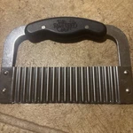 The Pampered Chef Kitchen Tool Silver And Black Crinkle Cutter ,stainless. Fixed Price $15.00.