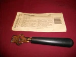 Pampered Chef Lemon Zester/scorer # 1133. Fixed Price $9.00.