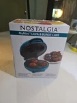 Nostalgia My Mini Lava Donut Muffin Bundt Cake Maker Blue New Box. Fixed Price $5.95.