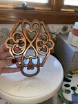 Pampered Chef 2943 Round Up From The Heart 2009 Cast Iron Hot Pad Trivet Retired. Fixed Price $10.00.