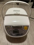 Tiger 5.5 Cup Microcomputer Rice Cooker JBV-S10U White. Fixed Price $39.95.