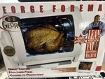 George Foreman GR59A Baby Rotisserie New Sealed. Fixed Price $249.99.