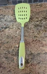 Oneida Silicone Slotted Spatula With Stainless Steel Handle Green Colorful 13". Fixed Price $12.00.