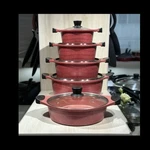 5-PIECE Red Non-stick Metal Pan Set W/ Lids, Round, Gas Stove Compatible. Fixed Price $160.00.