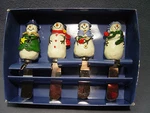 Set Of 4 St. Nicholas Square Knives, Cheese Spreaders Snowmen Christmas Winter. Fixed Price $10.00.