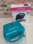 Holstein Housewares Electric Maker 2-PIE Non-stick Cooker Teal Pastry Cutter. Fixed Price $13.85.