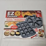New In Box, Ez Pockets As Seen On Tv, 4 Piece Set, Pans, Recipe Book, Cutter. Fixed Price $19.99.