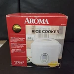 Aroma Rice Cooker ARC-914S 8-CUP Cooked Capacity One-touch White New In Box. Fixed Price $15.99.