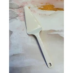 Vintage Pyrex Accessories Cream White Plastic Pie Cake Server Serrated 12". Fixed Price $11.69.