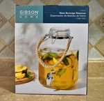 Gibson Home "ferris" 1.3 Gallon Glass Beverage Dispenser W/ Rope Handle & Spigot. Fixed Price $25.00.