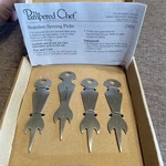 Pampered Chef #2905 Stainless Steel Serving Set Of 4 Picks Nib New Retired. Fixed Price $6.99.