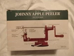 Johnny Apple Peeler Countertop Red Suction Cup Mount Wood Handle Original Box. Fixed Price $17.46.
