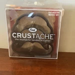 Mustache Style Sandwich Crust Cutter Friend's Of Fred New W/ Slight Box Damage. Fixed Price $11.00.