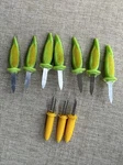 Rare - Vintage Stainless Steel & Plastic Green Yellow Corn Cob Holders Skewers. Fixed Price $25.00.