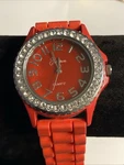 Ladies Geneva Sparkly Round Silver Tone Red Band Analog Watch. New Battery. Fixed Price $8.00.