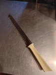 Vtg Quikuto Quikkle Usa Stainless Double Edge Serrated Carving Knife 15 1/2". Fixed Price $10.00.