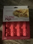 Mobi 12 Little Pigs Blankets Pink Oven-safe Silicone Mold Cavities. Fixed Price $25.00.