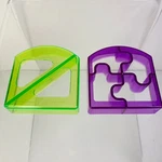 Mom Invented Crustless Sandwich Half Puzzle Cutters Purple Green. Fixed Price $14.00.