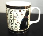 The Westminster Fine Porcelain Egyptian Black Cat Coffee Mug Gold Accents. Fixed Price $11.99.