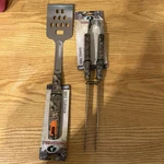 1 Mossy Oak Durable Stainless Steel Head With Bottle Opener Bbq Turner & Tongs. Fixed Price $21.00.
