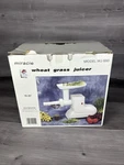 Miracle MJ-550 Electric Wheat Grass Juicer With Attachments. Fixed Price $59.99.