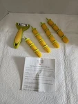 Kuhn Rikon Corn Cob Zipper & Holder 16 Pieces Kernal Remover Missing. Fixed Price $20.00.