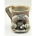 Glacier National Park Montana Studio Pottery Mug 3D Bear Den Coffee Cup Brown 4". Fixed Price $17.99.