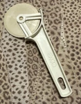 Ekco Beige Nylon Pizza Cutter Vintage 1986 0573. Fixed Price $14.99.