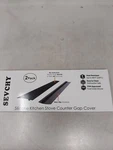 Sevchy Silicone Stove Gap Covers 2 Pack, Heat Resistant Counter Guard. Fixed Price $10.45.