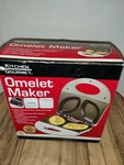 Kitchen Gourmet Electric Omelet Maker White SW-086. Fixed Price $21.99.
