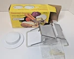 Heuck Feemster's Famous Vegetable Slicer With Safety Holder. Fixed Price $29.95.