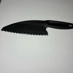 Pampered Chef Serrated Nylon Knife #1119. Fixed Price $15.00.