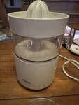 Vintage Oster Citrus Juicer 4100-08A White. Fixed Price $15.99.