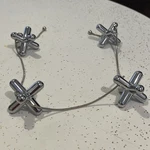 Alessi "tripod" Chrome Adjustable Element Trivet. Fixed Price $55.00.