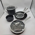 Ninja Foodi Neverstick Premium Hard-anodized 9 Piece Cookware Set. W/glass Lids. Fixed Price $75.00.