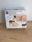 Wilton Beginning Buttercream Decorating Set, 20-PIECE Cake Kit. Fixed Price $15.99.