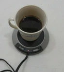 Beverage Coffer Milk Water Tea Drink Cup Mug Heat Warmer Non Stick Coat High Low. Fixed Price $12.00.