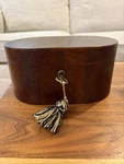 Bombay Co Oval Jewelry Box Mahogany With Burlwood Design Key & Tassel. Fixed Price $27.99.