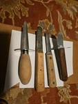 4 Vintage Oyster Clam Shucking Knife Wood Handles. Fixed Price $18.99.