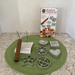 Norpro Rosette Timbale 7PC Set-wooden 2 Prong HANDLE/6 Cast Aluminum Molds. Fixed Price $7.00.