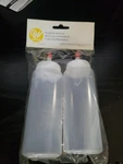 Wilton Mini Squeeze Bottles, 2-PIECE Brand New. Fixed Price $7.99.
