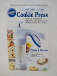 Wilton 2104-4011 Cookie Press 12 Discs New Comfort Grip. Fixed Price $19.99.