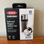 Oxo Salt And Pepper Shaker Set, Clear, Stainless Steel. Fixed Price $15.00.