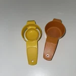 Vintage Tupperware Yellow Egg Separator 779-10 & Orange Tea Strainer 879-6. Fixed Price $12.99.