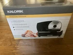 Kalorik Black Professional Food Slicer, Adjustable 200 Watts New 45493. Fixed Price $74.99.
