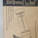 Pampered Chef 1525 Cookie Press SET,16 Disks, Handle, White Clear Plastic Metal. Fixed Price $29.99.