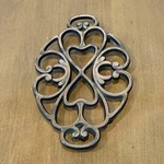 Pampered Chef Round Up From The Heart Cast Iron Copper Tone Trivet 2943 2009. Fixed Price $9.99.